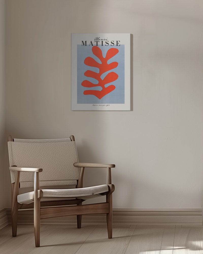 Ausstellungsplakat Henri Matisse mit korallenrotem Scherenschnitt-Blatt auf hellblauem Grund, schwarzer Schriftzug