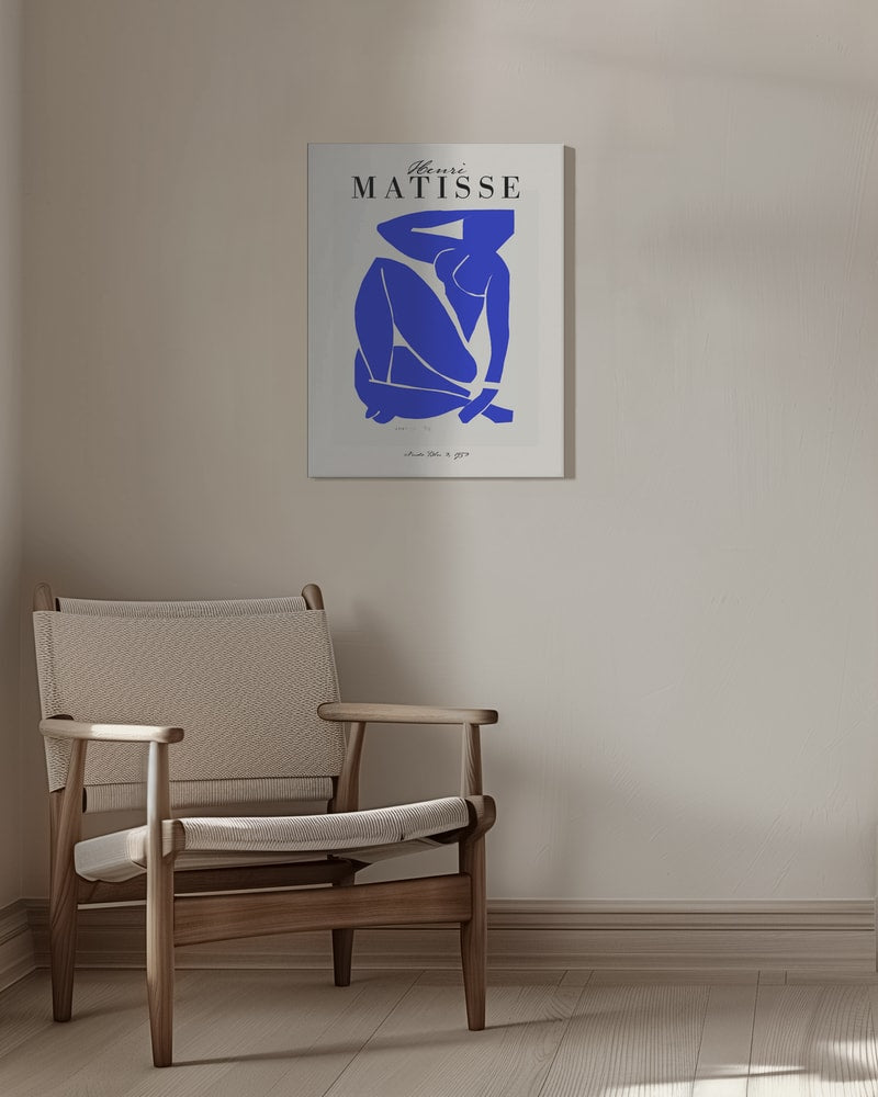 Ausstellungsplakat Henri Matisse mit blauem Scherenschnitt einer sitzenden Figur