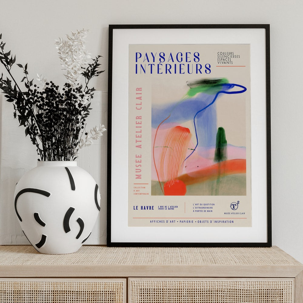 Ausstellungsplakat mit Schriftzug Paysages Intérieurs und bunten Pinselspuren