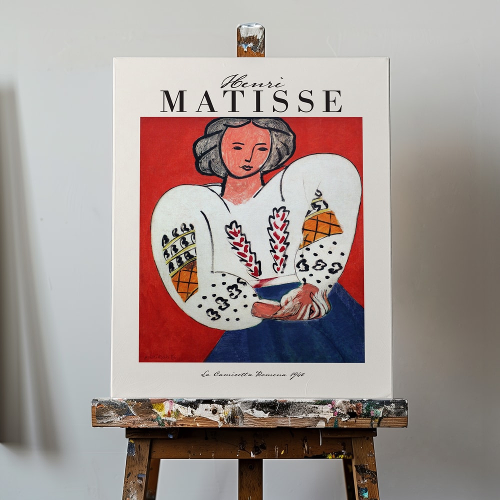 Ausstellungsplakat Henri Matisse mit Frau in bestickter weißer Bluse vor rotem Hintergrund